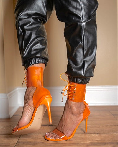 Nadiyah Orange PVC Ankle Cuff Heels